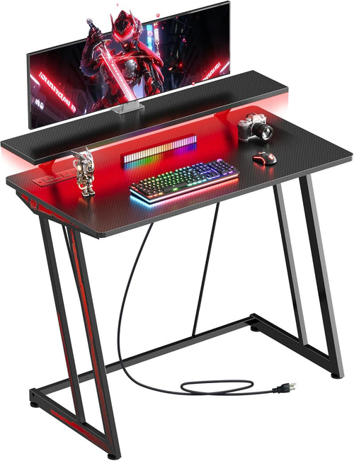 32-Inch Small RGB Gaming Desk with LED Lights & Power Outlets|Compact Gaming Table for PC Setup, Carbon Fiber Surface, Monitor Stand|Space-Saving Computer Desk for Esports & Streaming, Black